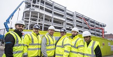 Staff working on the Broadmarsh redevelopment programme in front of the Broadmarsh Car Park site