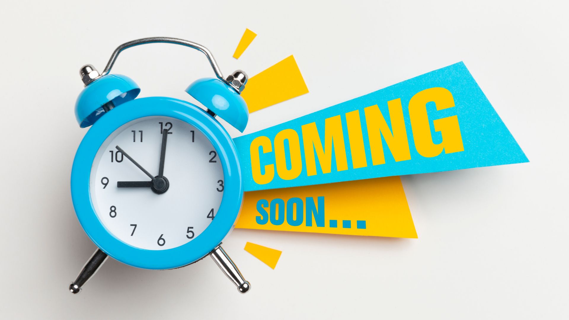 Image of a blue alarm clock and the words Coming Soon in blue and yellow writing.