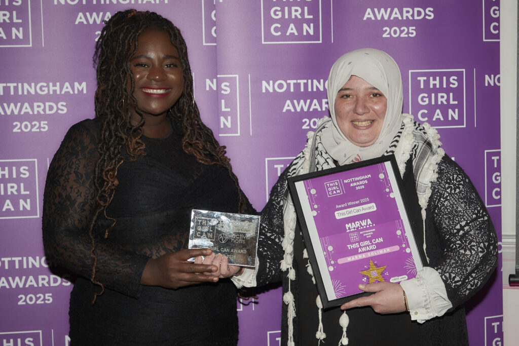 Left, Sam - the 2024 This Girl Can Nottingham Award winner, presenting the certificate and trophy to the 2025 This Girl Can Nottingham Award winner, Marwa Soliman